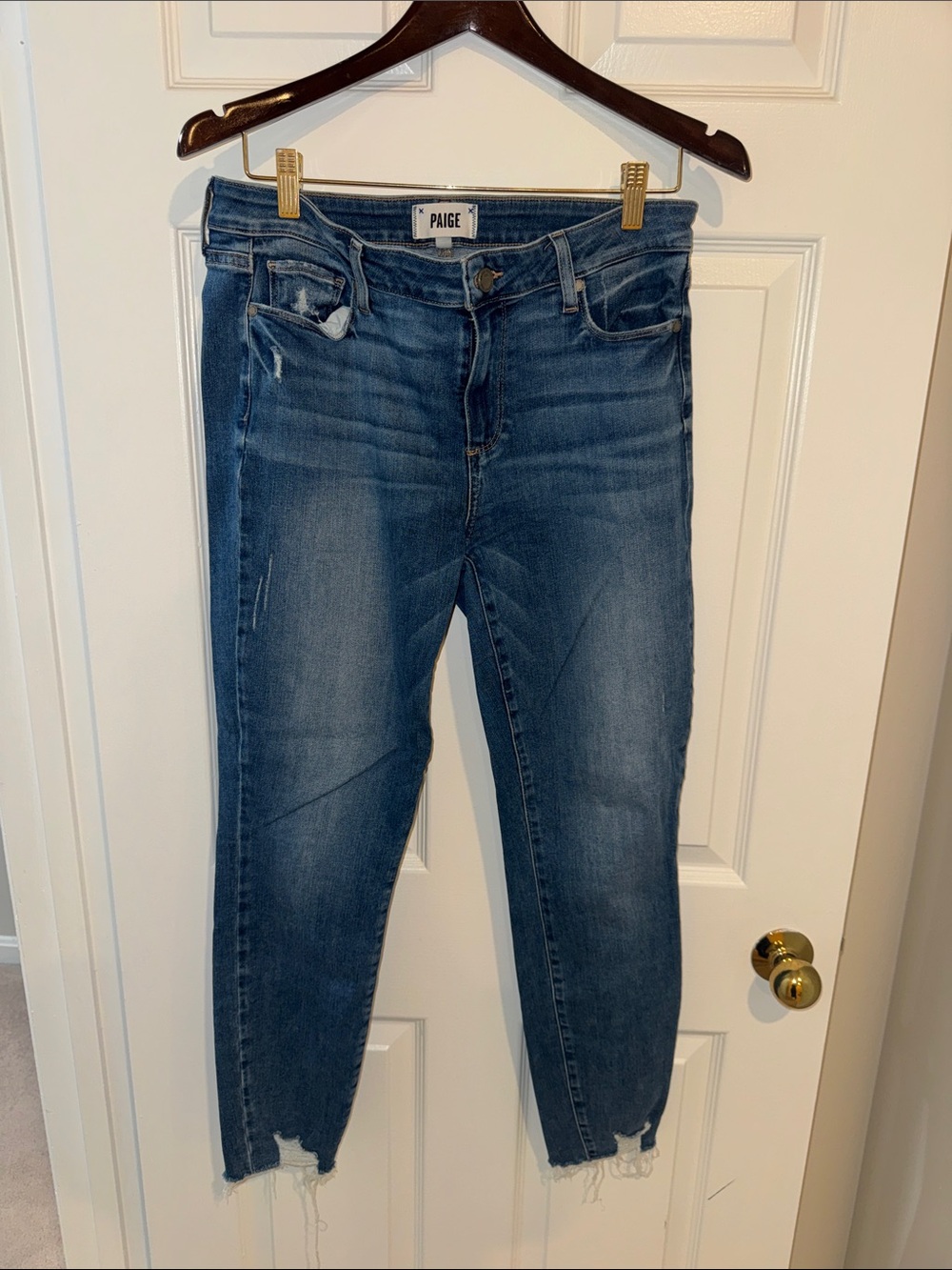PAIGE Medium Blue Distressed Cropped Jeans